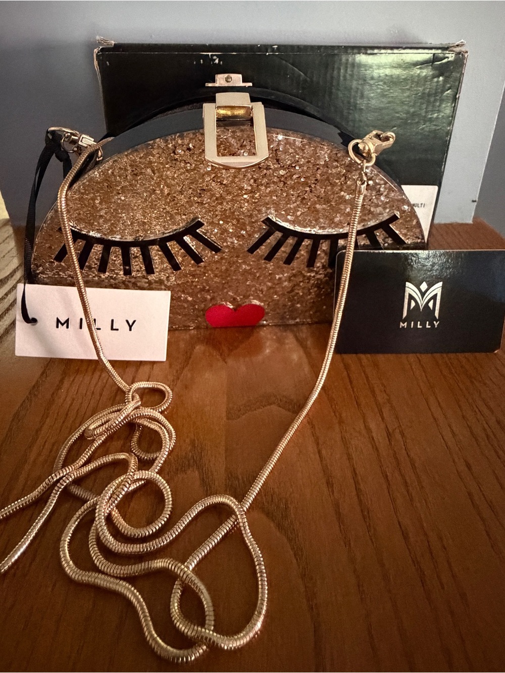 Milly Gold Glitter Crossbody with Black Lash Detail and Red Heart